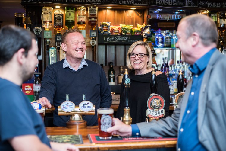 Chris amd Claire with customers